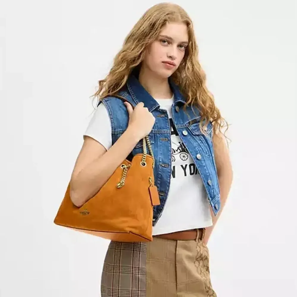 NEW‼️Coach Evelyn Shoulder Bag With Quilting And Charm CET33 suede/Gold/Marigold
